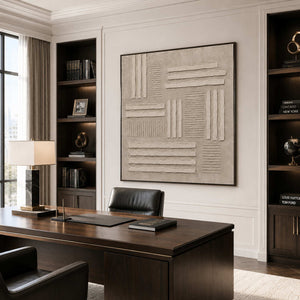 A Woven Rhythm: beige abstract artwork with raised horizontal and vertical bands displayed behind an office desk.