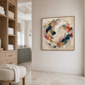 Textured abstract wall art displayed in a bright neutral bathroom retreat.