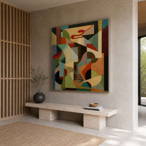 A Colorful Chorus in a silver frame above a pale stone bench beside a wood-slat entryway screen.