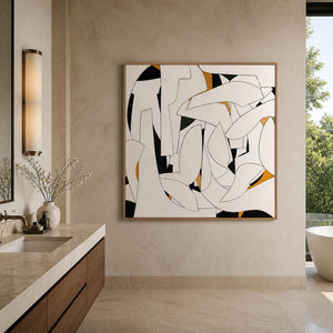 Cream geometric painting beside a bathroom counter and wall light.