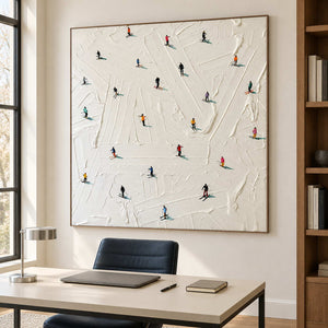 Skiing scene above a pale desk beside wooden shelving.