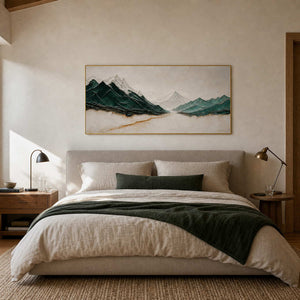 Textured panoramic mountain wall art displayed above a serene mountain-home bed.