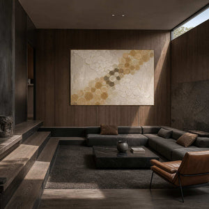 Golden circles crossing an ivory field wall art in a contemporary stair hall.