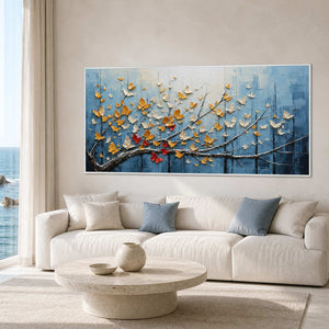 Blue butterfly wall art displayed in a bright ocean-view lounge.