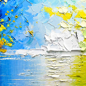 Close-up of raised blue and white paint with yellow leaves and rippled reflections.