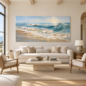 Pale coastal wave artwork above a cream sofa beneath exposed wooden ceiling beams.
