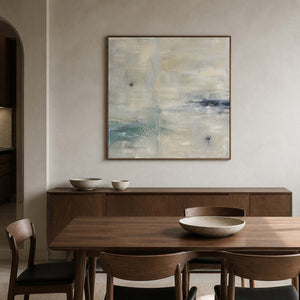 Soft ivory and aqua abstract canvas above a walnut dining table.