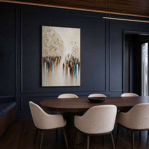 Textured figurative wall art in a deep navy dining room.