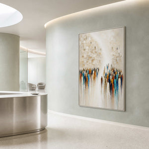 Modern crowd painting displayed in a light wellness reception area.