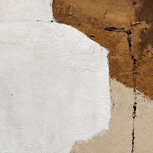 Close view of rough white and brown paint areas with fine black scratches.