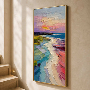 Tall pastel shoreline artwork displayed beside a warm wood stairway.