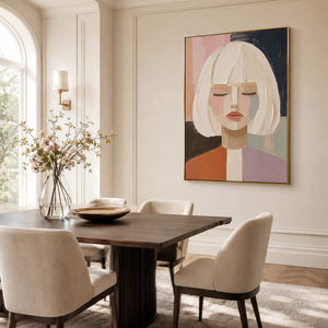Modern portrait canvas in a refined dining room.