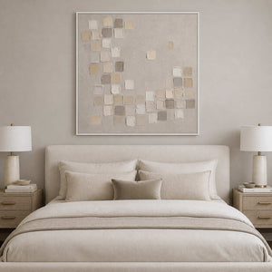 Calming ivory and taupe wall art above a serene bedroom with a white frame.