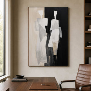 Wood framed painting of two pale figures behind a desk in a home office.