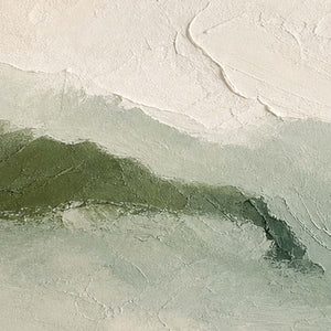 Close-up of raised hand-painted texture in green, white, and neutral.