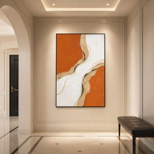 Vertical terracotta wall art displayed in a polished entryway.