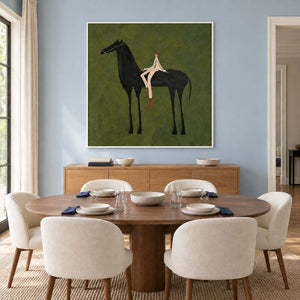 Horse-and-rider artwork behind a round dining table against pale blue.
