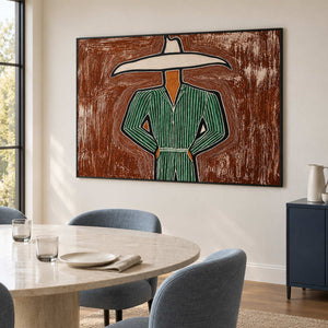 Wide hat artwork behind a pale round table and blue chairs.
