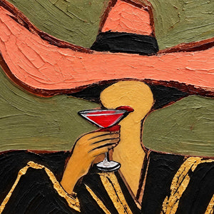 Close-up of A Toast to Freedom showing a coral hat, a raised red-filled glass and gold-colored lines on black clothing.