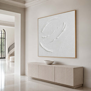 Sculptural white abstract wall art displayed in an elegant luxury entryway.