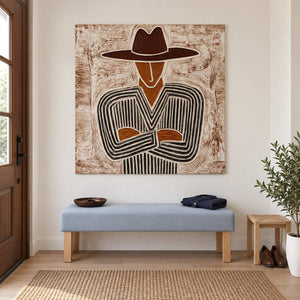 Brown and cream portrait above a light blue entryway bench near a leafy plant.