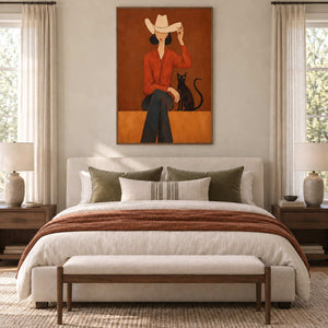 At Leisure in a wood frame above a cream bed with a rust throw and a cushioned bench.