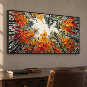 Orange-leaf canopy artwork behind a dark desk and brown chair in a study.