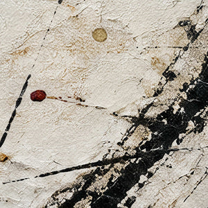 Close-up of black gestural marks, fine lines, and gold accents.