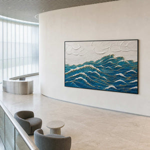 Deep blue waves edged with gold wall art in a contemporary commercial lobby.