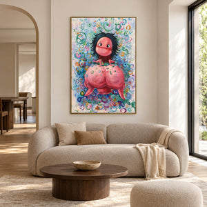 Artwork showing a dark-haired, wide-eyed character above a rounded pink creature amid colorful rings in a living room above seating, with a gold-colored frame.