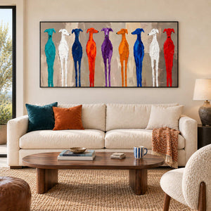 Cheerful Company in a black frame above a cream sofa with turquoise and orange cushions and a round wood coffee table.