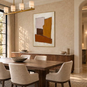 Close at Heart in a gold frame beside a walnut dining table and upholstered chairs.