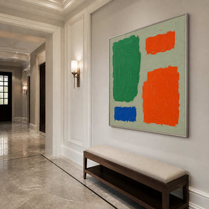 Color Blocks Hold the Room in a silver-framed entryway
