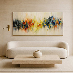 Colorful textured abstract wall art in a warm modern living room.