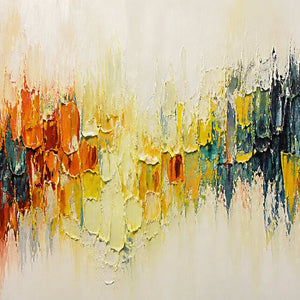 Close-up of thick orange, yellow, teal, blue, and charcoal paint.