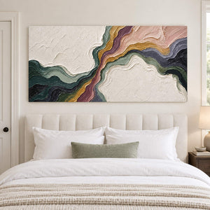 Flowing green, blush, ochre and charcoal bands through white texture without an outer frame, displayed above a bed.