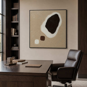 Dark Stone Held in White in a black-framed executive office