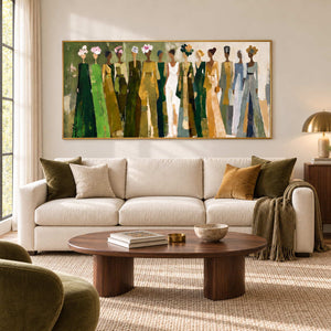 Days in Full Bloom in a gold frame above a cream sofa with olive and ochre cushions and an oval wood table.