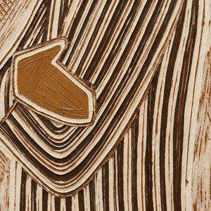 Detail of a brown hand over the bent sleeve, surrounded by curved cream lines.