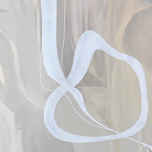 Close view of crossing white ribbon curves and delicate lines over softly layered neutrals.
