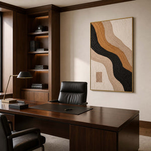 Warm earth-tone abstract wall art in a modern private office with a gold metal frame.