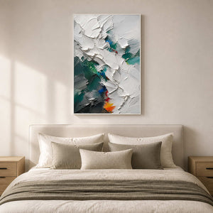 Textured green abstract painting creates a crisp focal point above the bed.