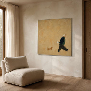 Square figurative wall art displayed beside a softly lit reading chair.