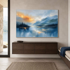 Blue and gold lake wall art above a deep oak entryway console.