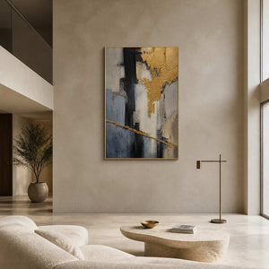 Gold and charcoal textured abstract wall art displayed in a modern living room.