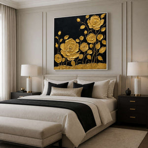 Black and gold rose wall art above a sophisticated bedroom bed.