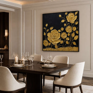 Textured gold floral wall art in a refined dining room with a black frame.