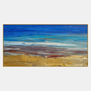 Panoramic coastal wall art with cobalt water and sculptural gold sand.