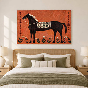 Horse-and-flowers painting over a woven headboard and green bedding.