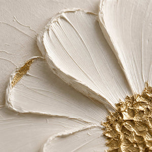 Close-up of raised ivory petal texture and hand-painted gold accents.